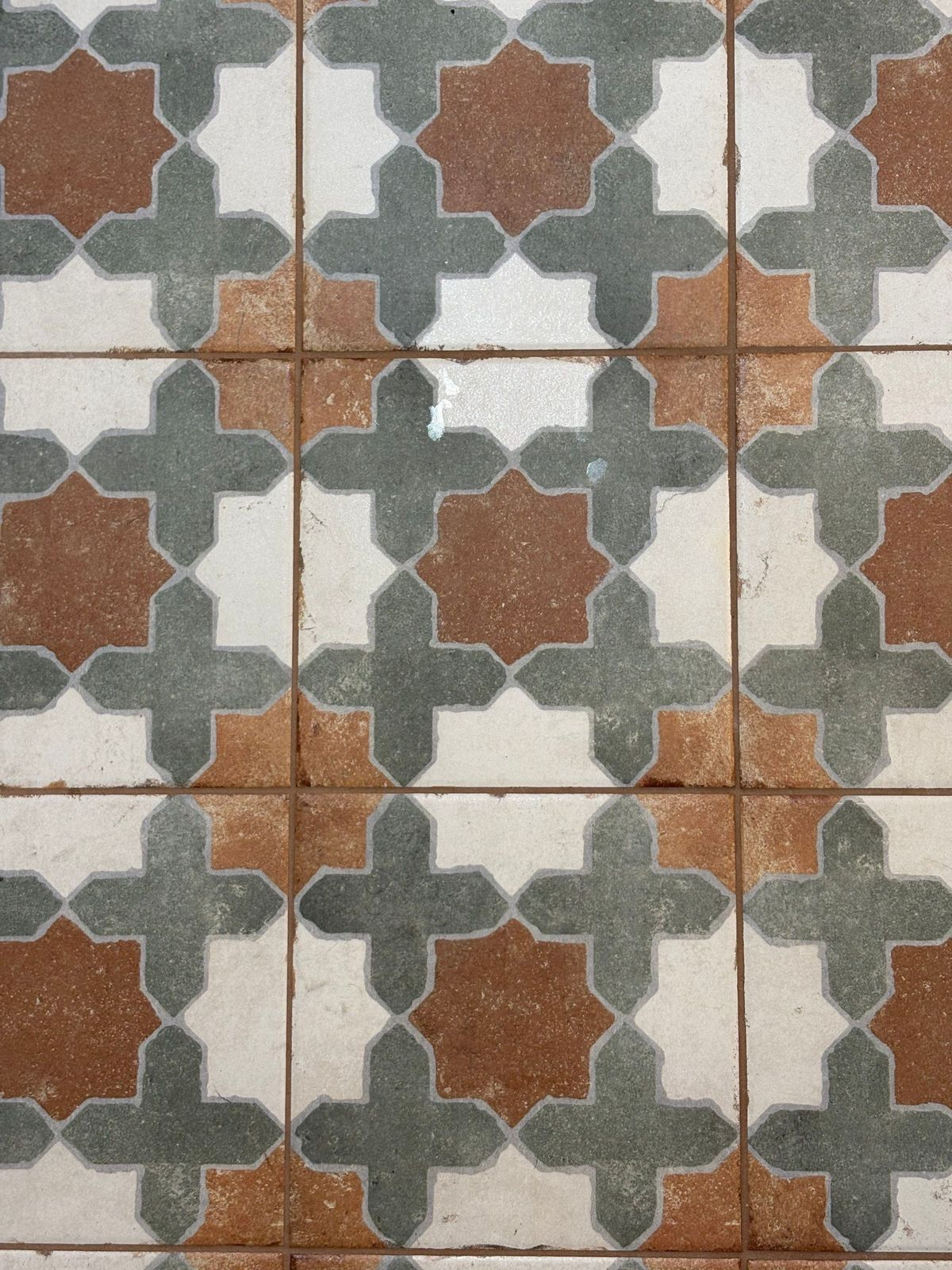 New Cove decorative patterned tile flooring detail.