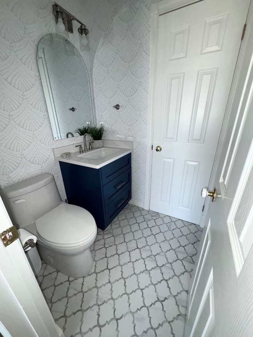 Kensington powder room — finished interior from the doorway.