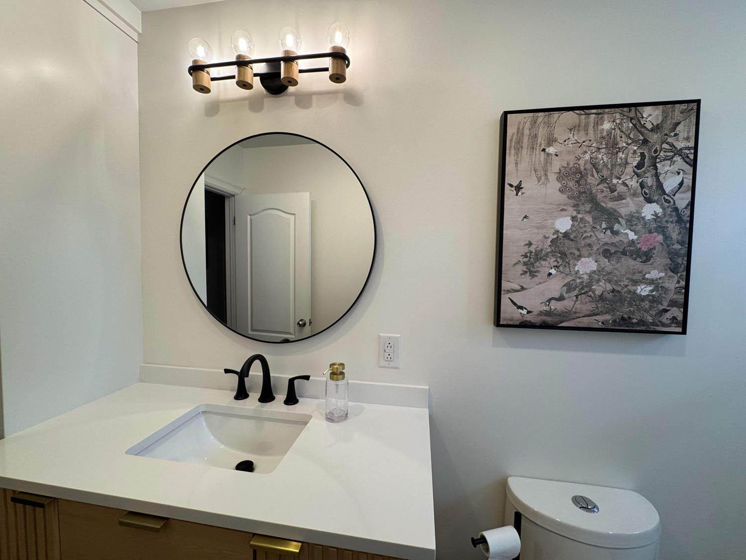 Laurier Street bathroom — finished interior.