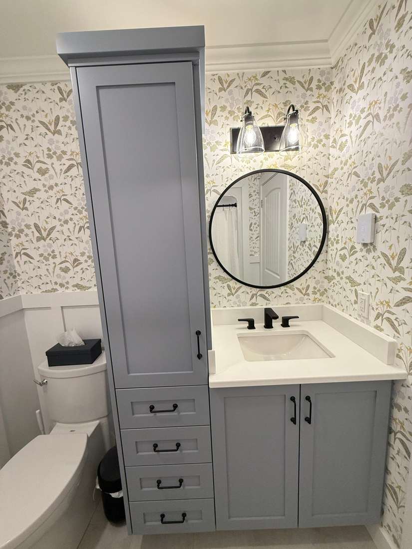 Glenlonan Main — finished vanity and round mirror.